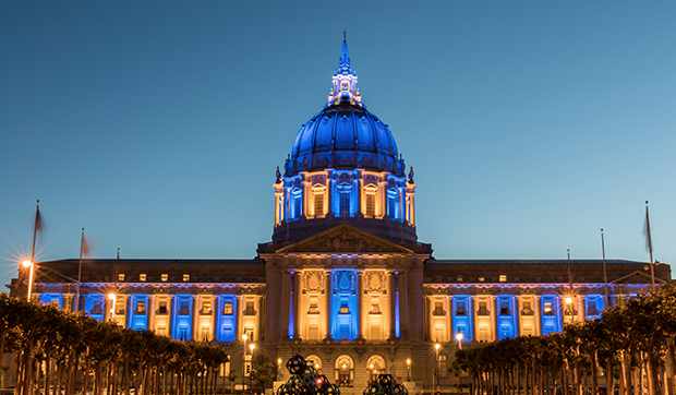San Francisco City Hall lit with colored lights